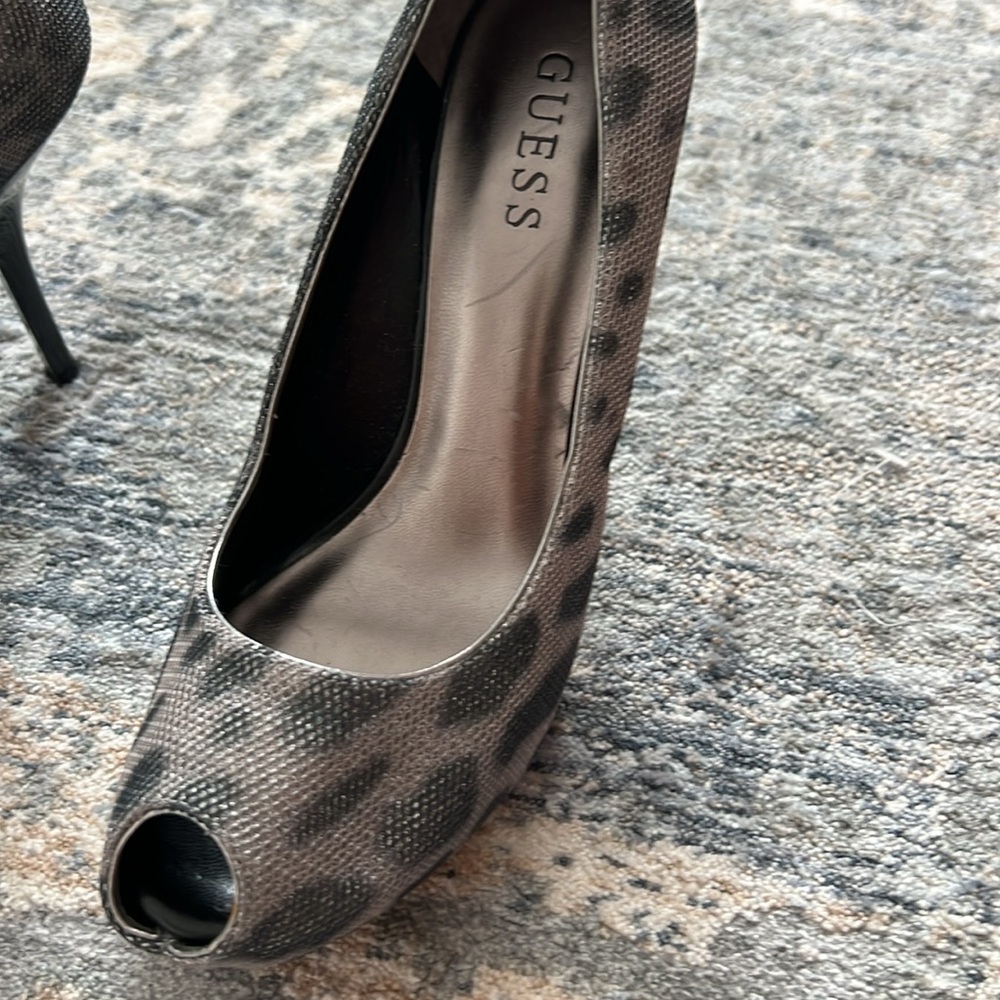 Gorgeous silver and black print Guess Heels.  size 7.  worn once !